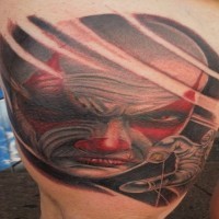 Awesome scary clown tattoo on thigh