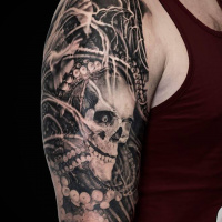 Awesome skull and tentacles tattoo on shoulder