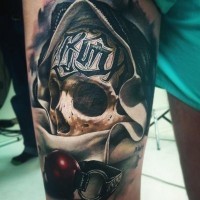 Awesome skull with black signs on forehead tattoo by Benjamin Laukis