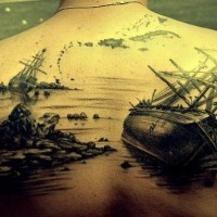 Awesome sunken ships tattoo on whole back