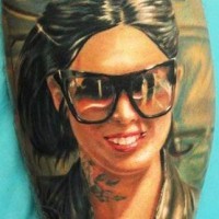 Awesome very detailed beautiful woman portrait tattoo on leg