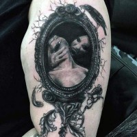 Awesome very detailed black ink vampire portrait tattoo on thigh