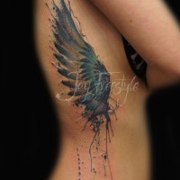 Awesome watercolor one wing tattoo by Jay Freestyle