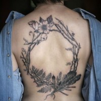Awesome wild flowers tattoo on back