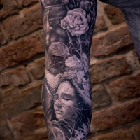Awesome woman and reses full sleeve tattoo