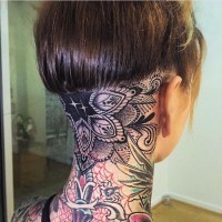 Baroque style black ink flower tattoo on neck