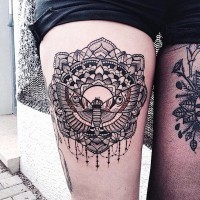 Beautiful Baroque style black and white flower tattoo on thigh combined with night butterfly