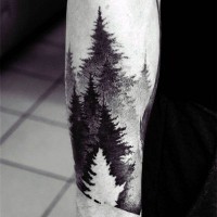 Beautiful black and white old forest tattoo on arm