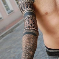 Beautiful black polynesian tattoo on full sleeve