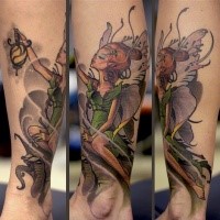 Beautiful colored illustrative style leg tattoo of fantasy Tinkerbell