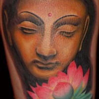 Beautiful colorful buddha with lotus tattoo