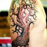 Beautiful colorful tree tattoo on shoulder