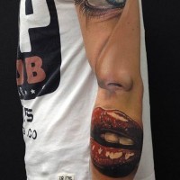 Beautiful designed and painted massive colored womans portrait tattoo on sleeve