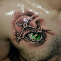 Beautiful designed colored eye with clock tattoo on chest