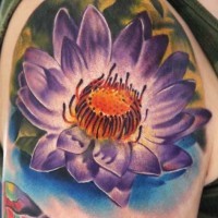 Beautiful detailed purple lotus tattoo on shoulder