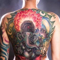Beautiful ganesha and lotus tattoo on back for women