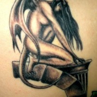 Beautiful gargoyle girl tattoo