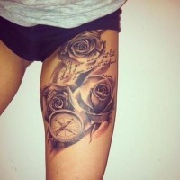 Beautiful gray roses with compass tattoo on thigh for women