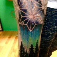 Beautiful illustrative style arm tattoo of interesting ornament with dark forest