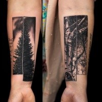 Beautiful looking black and white forearm tattoo of various trees