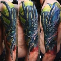 Beautiful looking colored half sleeve tattoo of impressive evil Alien