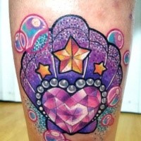 Beautiful looking colored leg tattoo of heart shaped diamond and stars