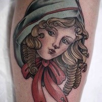Beautiful looking colored leg tattoo of doll