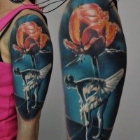 Beautiful looking colored shoulder tattoo of red flower and ballet dancer