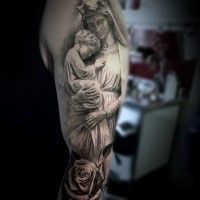Beautiful looking colored shoulder tattoo of woman with child and rose