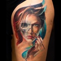 Beautiful looking colored thigh tattoo of mystical woman stylized with human skull part