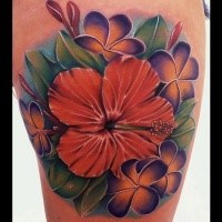 Beautiful looking colored thigh tattoo of flower with leave s