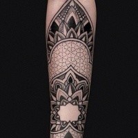 Beautiful looking dotwork style forearm tattoo of nice floral ornaments