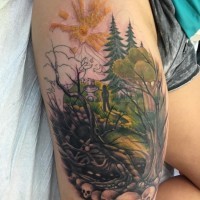 Beautiful looking half colored human figure in dark forest tattoo on thigh stylized with skulls
