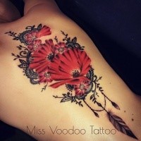 Beautiful painted colored by Caro Voodoo upper back tattoo of big flowers with feather