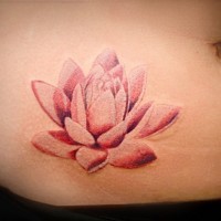 Beautiful pink lotus flower tattoo on stomach