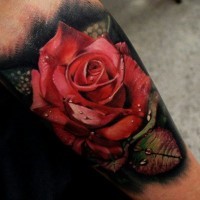 Beautiful super realistic red rose tattoo