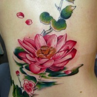 Beautiful red  lotus tattoo on ribs
