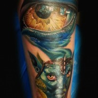 Tatuaje  de ojo enorme realista y mujer de Avatar