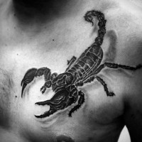 Big 3D realistic detailed black ink scorpion tattoo on chest
