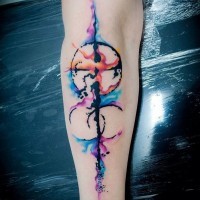 Big abstract style colorful mystical ornaments tattoo on forearm