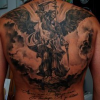 Big awesome black and white very detailed angel warrior tattoo on back with lettering