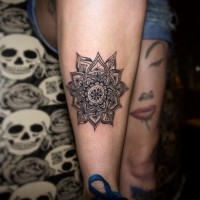 Big beautiful black and white leg tattoo of ornamental flower