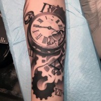 Big black ad white old broken clock tattoo on arm