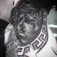 Big black and white antic Medusa statue tattoo on neck