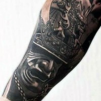 Big black and white detailed forearm tattoo of Asian samurai warriors helmet