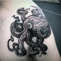 Big black and white detailed octopus tattoo on shoulder