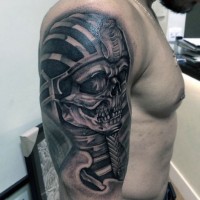 Big black and white Egypt creepy skeleton statue tattoo on shoulder zone