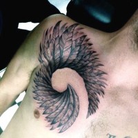 Big black and white interesting shaped feather tattoo on chest