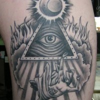 Big black and white mystical Masonic tattoo on thigh