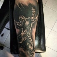 Big black and white titan like tattoo on arm